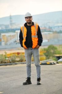 Construction worker in safety gear representing the PTW Day 0 application stage