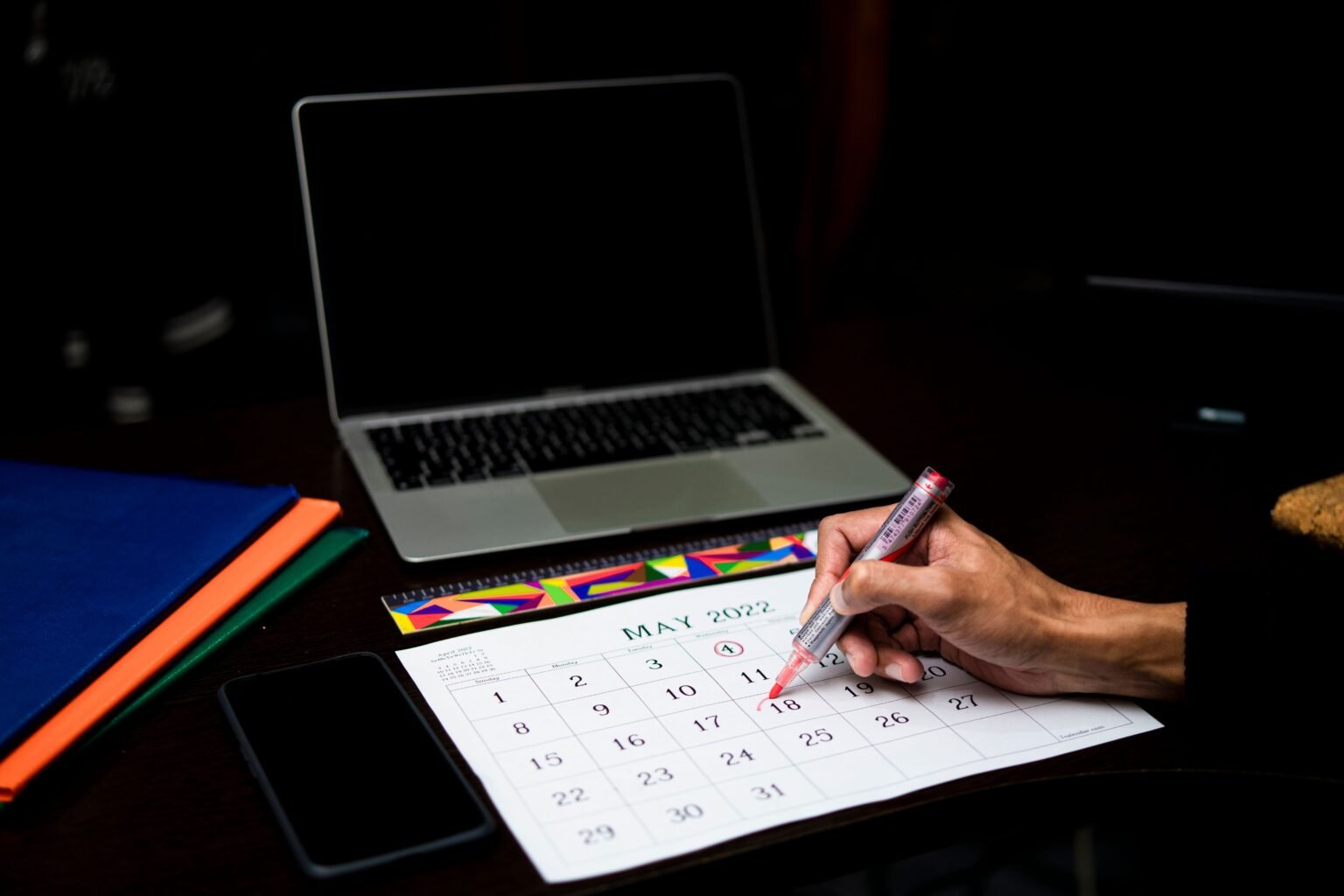 bizSAFE Portal Downtime 27 Oct to 2 Nov 2026 – PEER bizSAFE portal downtime: person planning application deadlines on a calendar beside a laptop